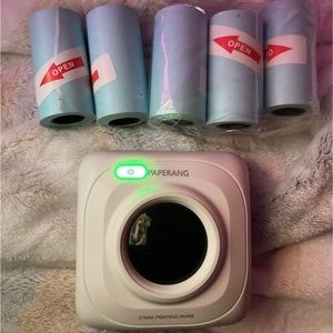 POCKET THERMAL PRINTER + rolls.
BT Wireless. It works with Paperang app.